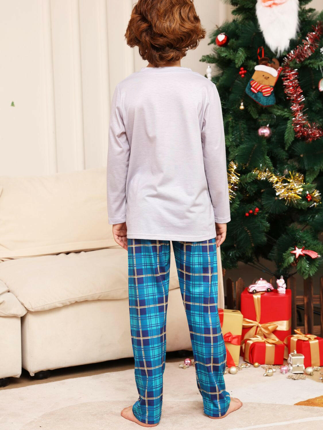 Rudolph Graphic Long Sleeve Top and Plaid Pants Set.