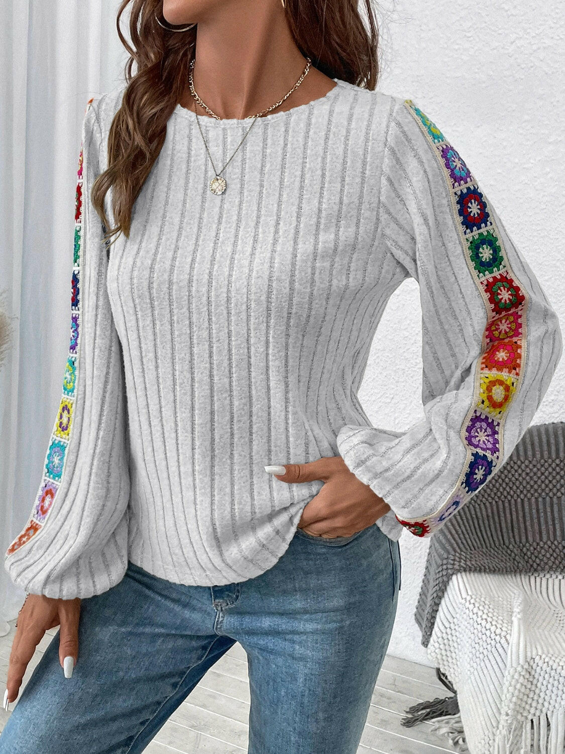 Embroidered Round Neck Long Sleeve Top.