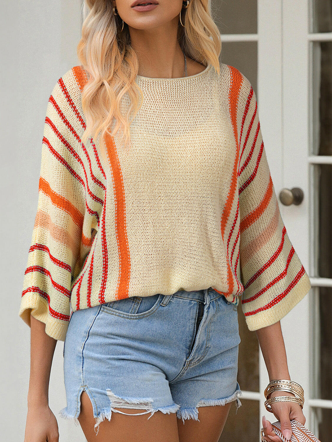 Striped Boat Neck Three-Quarter Sleeve Knit Top.