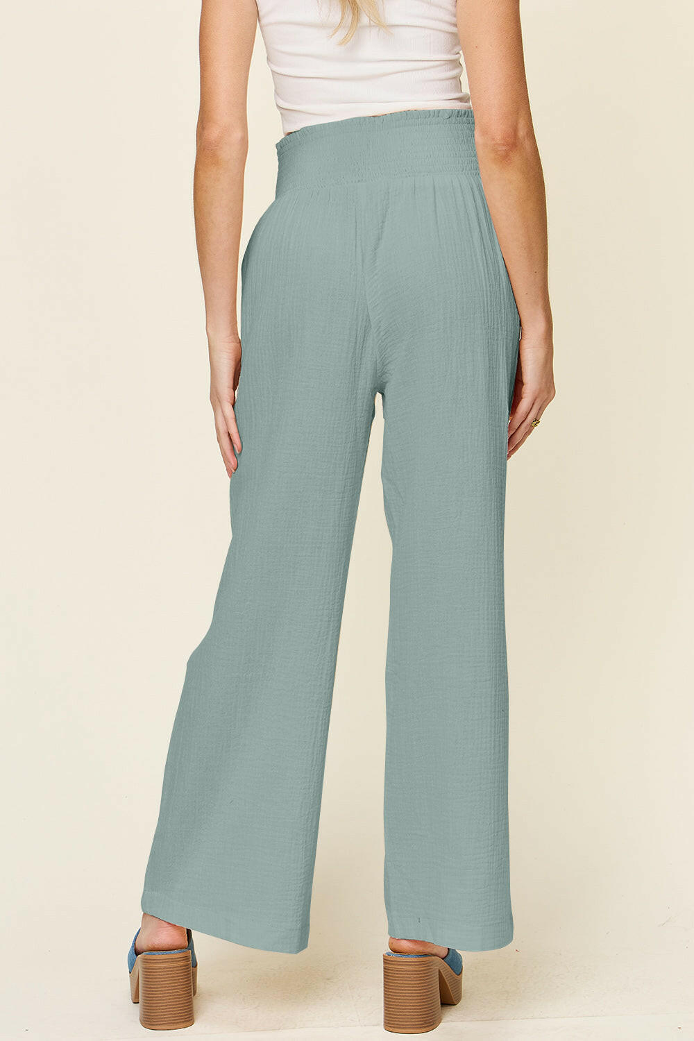 Textured Smocked Waist Wide Leg Pants.