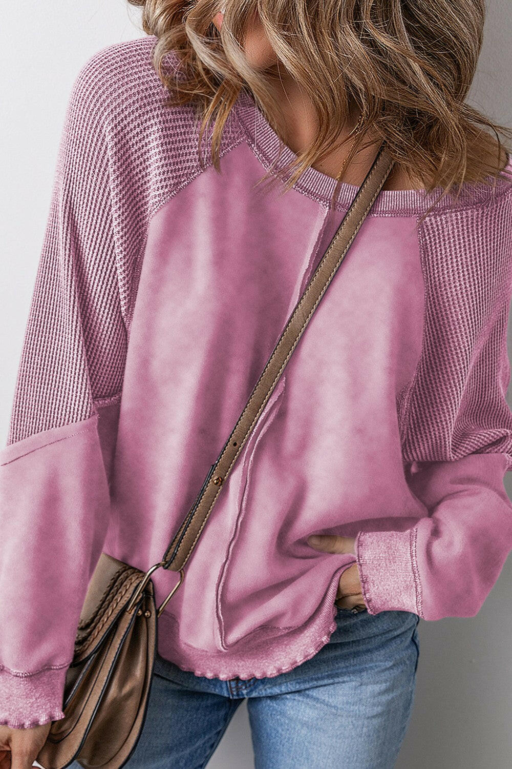 Exposed Seam Long Sleeve Sweatshirt.