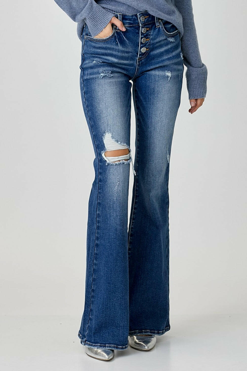 RISEN Distressed Button-Fly Flare Jeans.