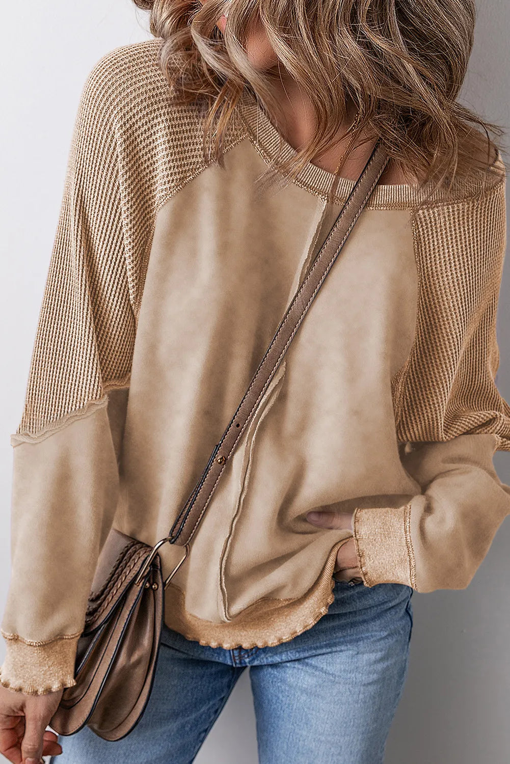 Exposed Seam Long Sleeve Sweatshirt.