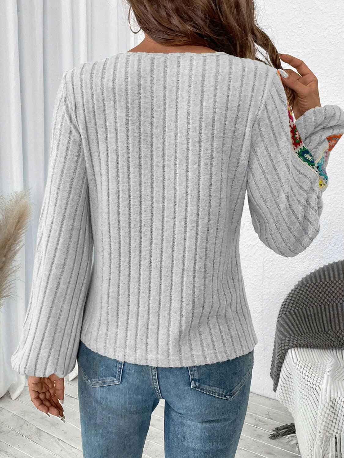 Embroidered Round Neck Long Sleeve Top.