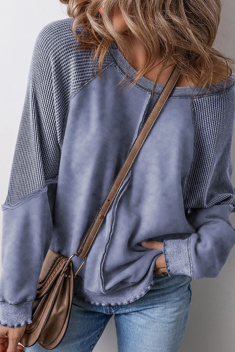 Exposed Seam Long Sleeve Sweatshirt.