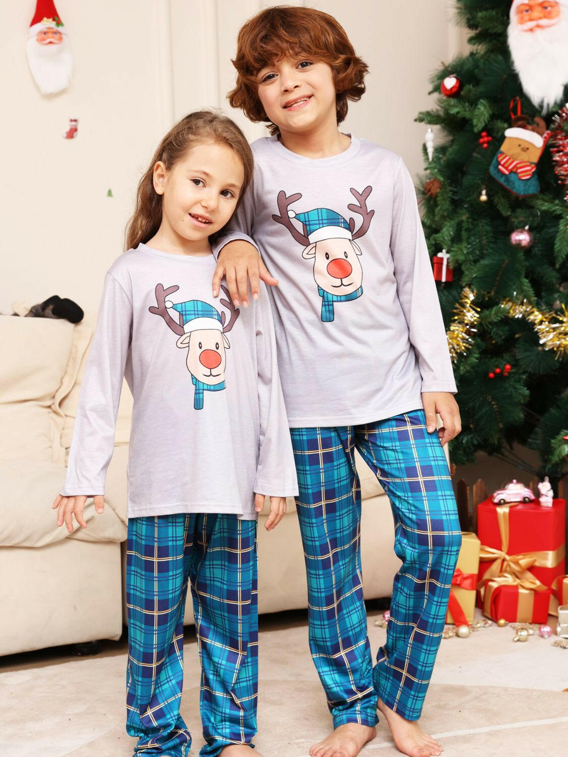 Rudolph Graphic Long Sleeve Top and Plaid Pants Set.