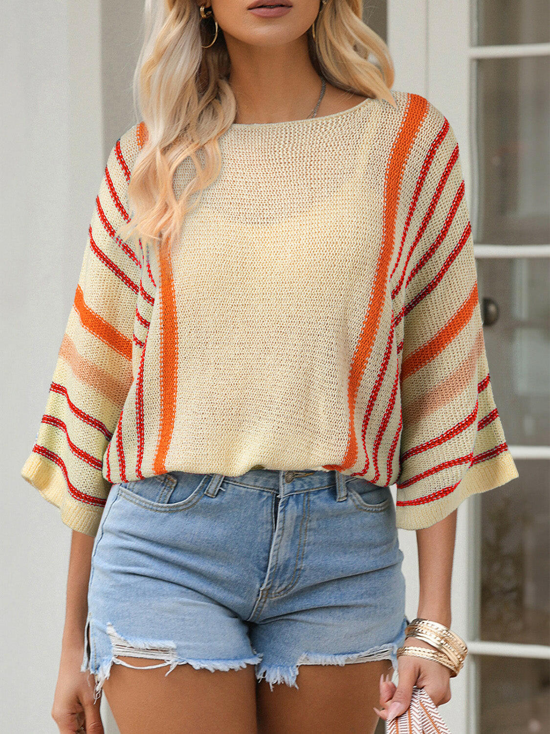 Striped Boat Neck Three-Quarter Sleeve Knit Top.