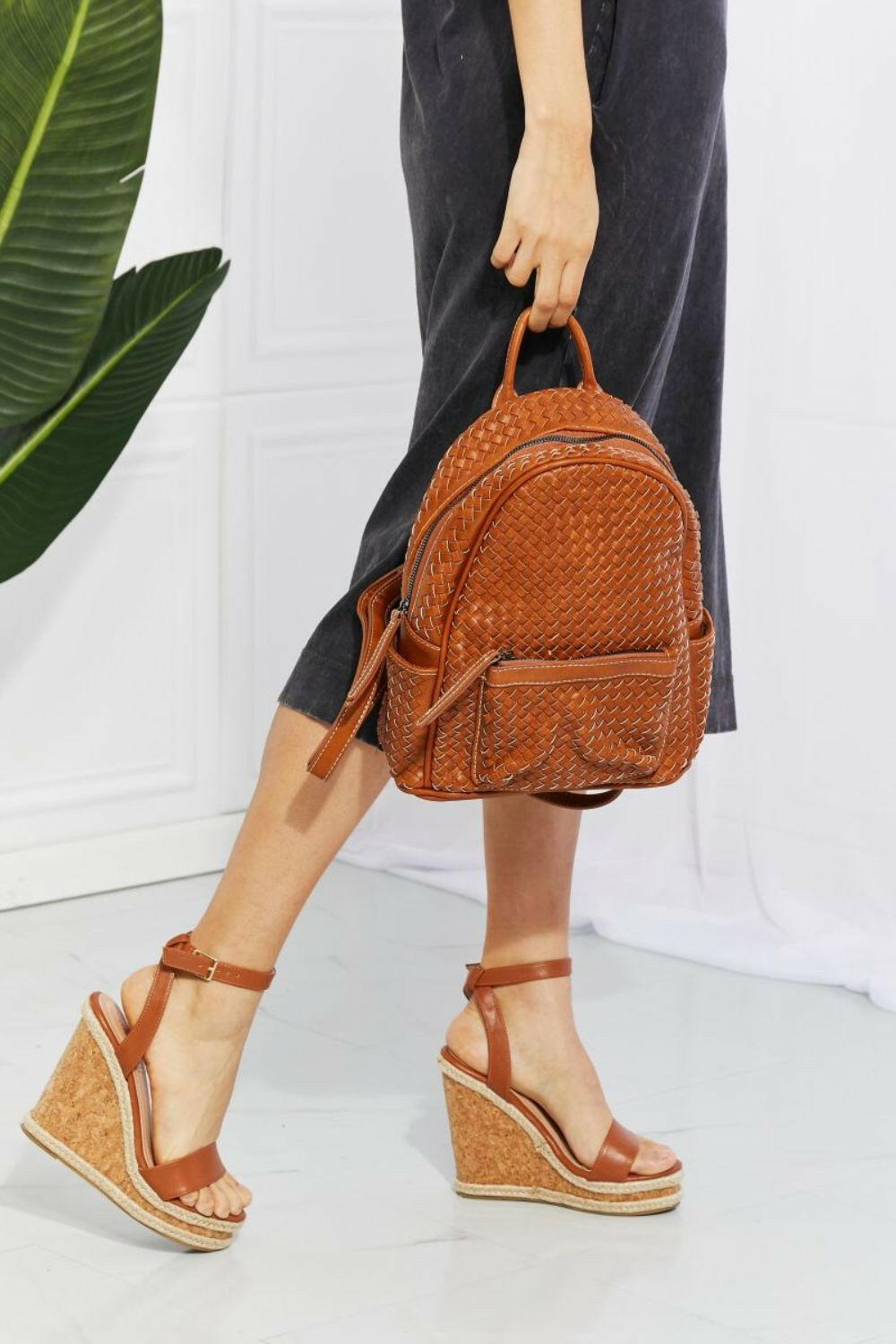 SHOMICO Certainly Chic Faux Leather Woven Backpack.