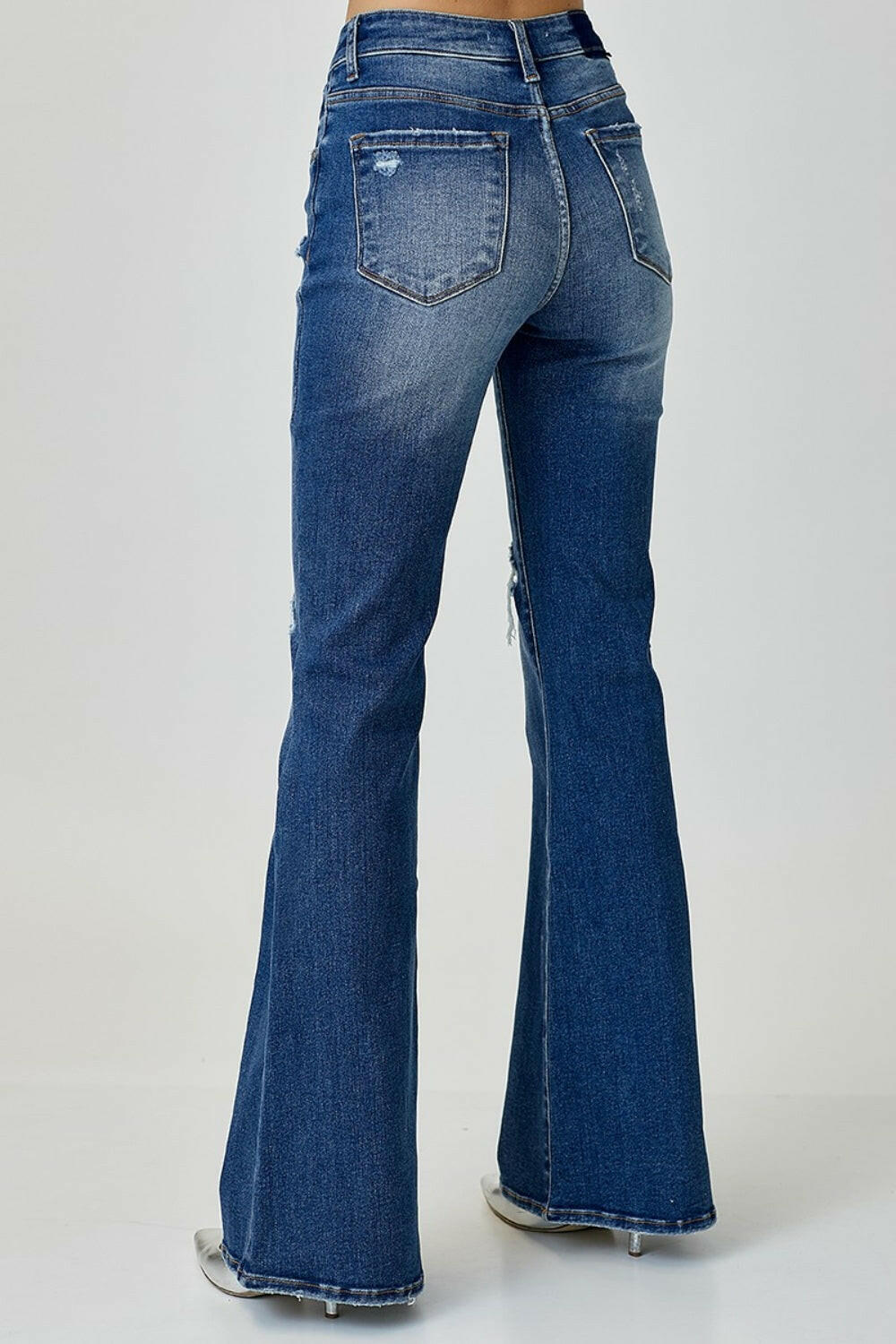 RISEN Distressed Button-Fly Flare Jeans.