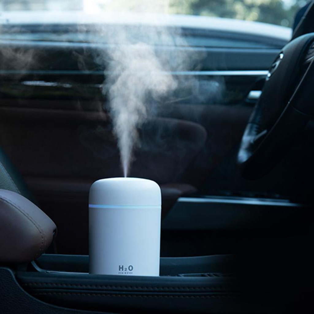 Versatile Serenity Portable Air Humidifier and Aroma Essential Oil Diffuser: Compact Comfort for Car and Home - Enhance Your Space with Aromatic Bliss.